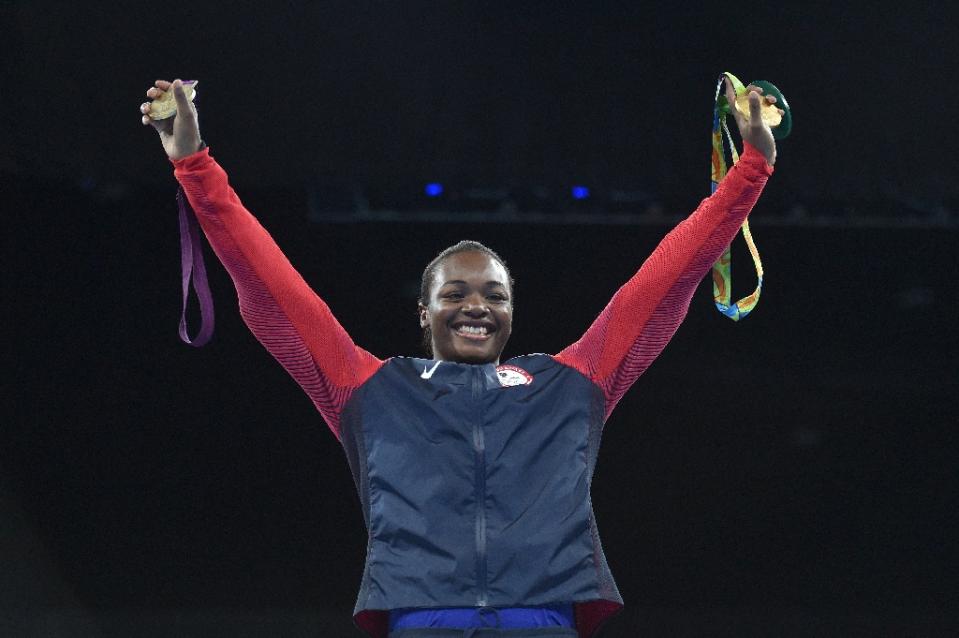 Clarissa Shield celebrates with her two gold medals, from London and Rio. (AFP)