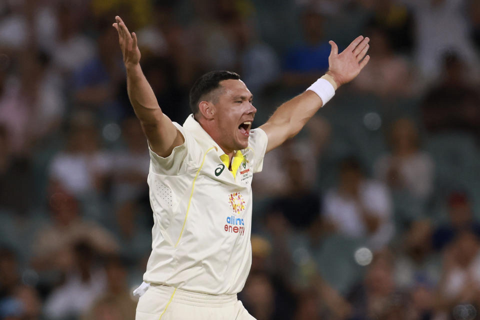 Australia's Scott Boland celebrates taking the wicket of th eWest Indies' Shamarh Brooks on the third day of their cricket test match in Adelaide, Saturday, Nov. 10, 2022. (AP Photo/James Elsby)