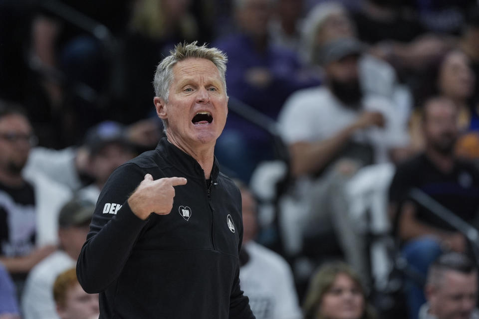 Golden State Warriors head coach Steve Kerr gestures during the first half of an NBA basketball play-in tournament game against the Sacramento Kings, Tuesday, April 16, 2024, in Sacramento, Calif. (AP Photo/Godofredo A. Vásquez)