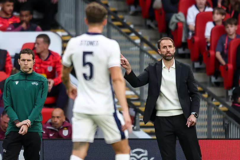 Gareth Southgate gives instructions to John Stones