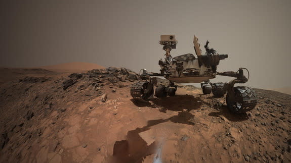 NASA's Curiosity Mars rover drilled into a rock target called "Buckskin" on lower Mount Sharp as seen in a self-portrait which combined several images taken by Curiosity's Mars Hand Lens Imager (MAHLI) on Aug. 5, 2015. Image released Aug. 19, 2