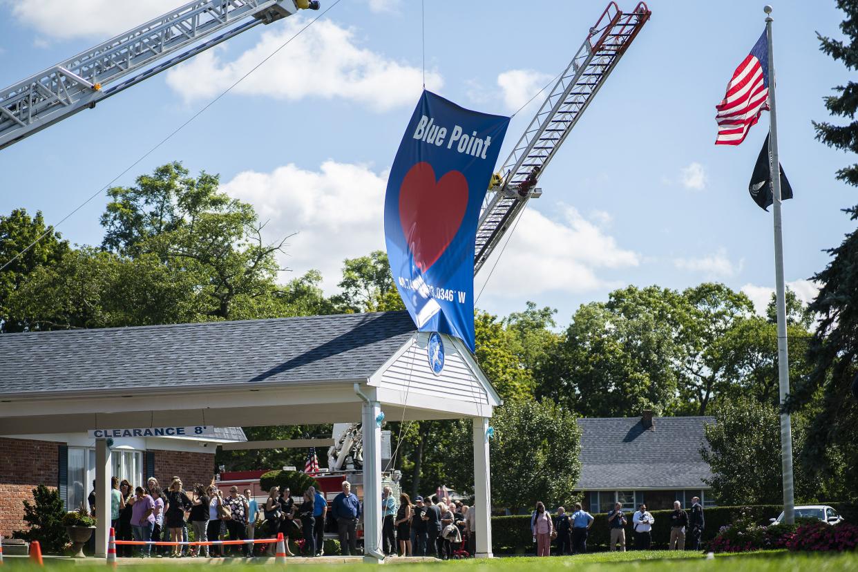 People attend the funeral service of Gabby Petito at Moloney's Funeral Home in Holbrook, N.Y. Sunday, Sept. 26, 2021. (AP Photo/Eduardo Munoz Alvarez)