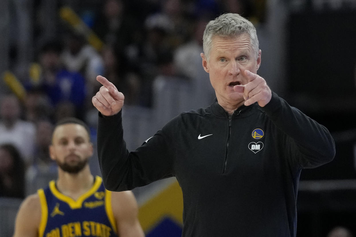 Golden State Warriors coach Steve Kerr gestures to players during the second half of the team's NBA basketball game against the Los Angeles Lakers in San Francisco, Thursday, Feb. 22, 2024. (AP Photo/Jeff Chiu)