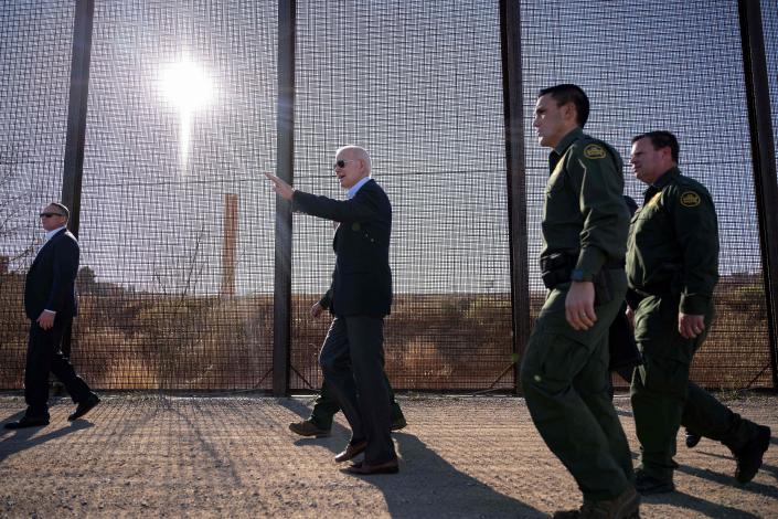 President Biden walks along the U.S.-Mexico border fence in El Paso, Texas, on Jan. 8, 2023. / Credit: JIM WATSON/AFP via Getty Images