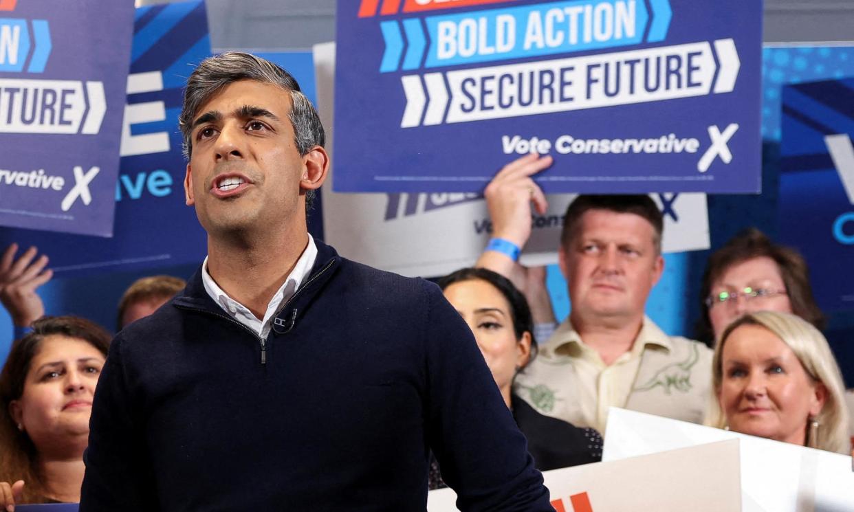 <span>Rishi Sunak delivers a speech during his final election rally at Romsey rugby football club in Hampshire.</span><span>Photograph: Claudia Greco/AFP/Getty Images</span>