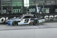 Noah Gragson (9) takes the checkered flag to win a NASCAR Xfinity Series auto race at Bristol Motor Speedway Monday, June 1, 2020, in Bristol, Tenn. (AP Photo/Mark Humphrey)