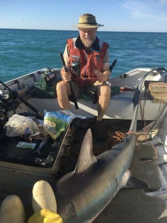 Sophie Hunt helped to rescue the shark and drag it back into the water. Photo: 7 News