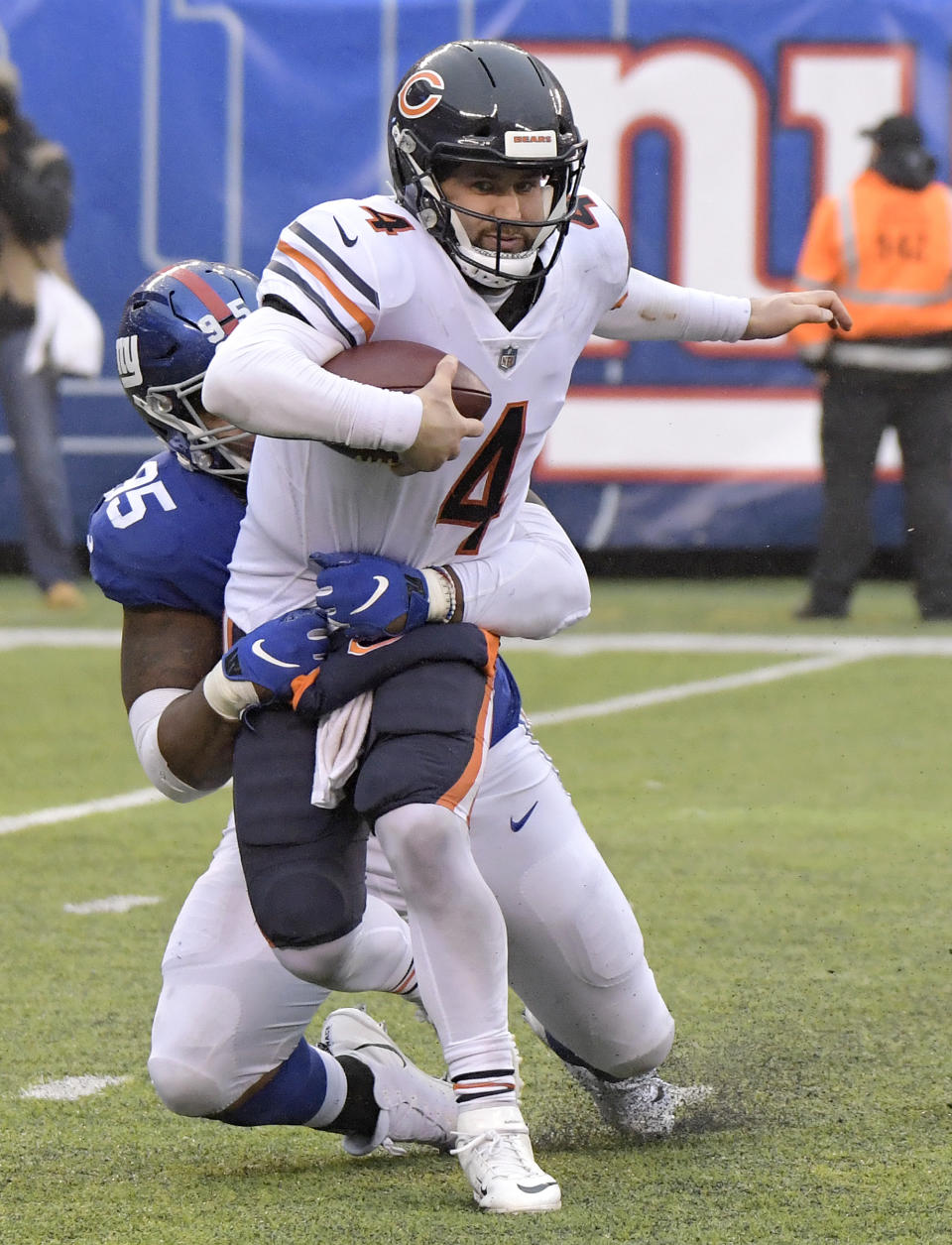 Chicago Bears quarterback Chase Daniel (4) is sacked by New York Giants defensive end B.J. Hill (95) during the first half of an NFL football game, Sunday, Dec. 2, 2018, in East Rutherford, N.J. (AP Photo/Bill Kostroun)