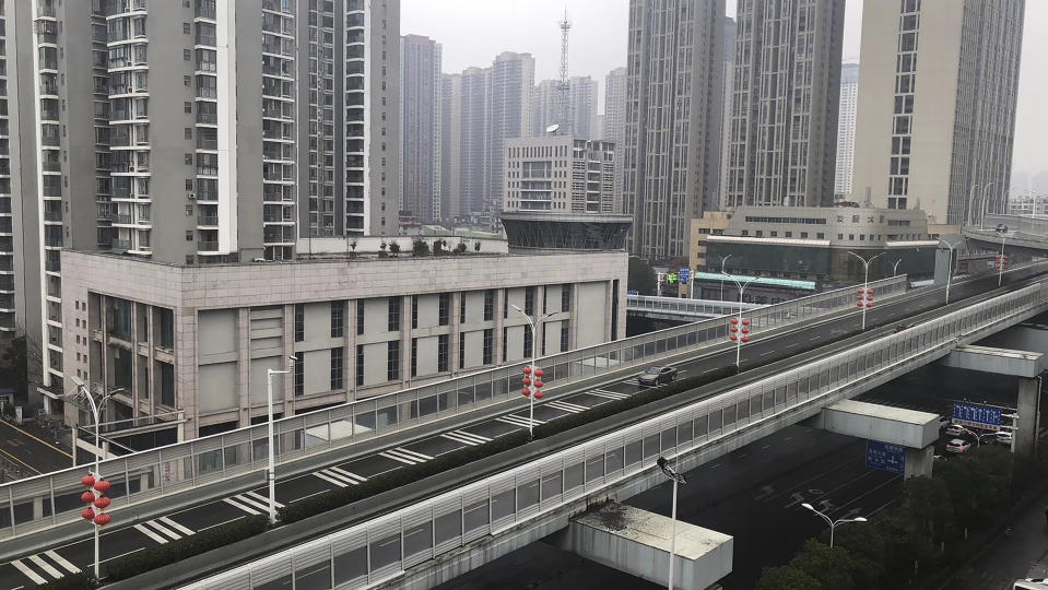 In this photo provided by Chen Yanxi, a nearly-deserted expressway is seen in Wuhan in central China's Hubei Province, Friday, Jan. 24, 2020. China’s attempt to stop a deadly virus by cutting off access to cities with 25 million inhabitants is a step few other governments would consider but is made possible by the ruling Communist Party’s extensive social controls and experience fighting the 2002-03 outbreak of SARS. (Chen Yanxi via AP)