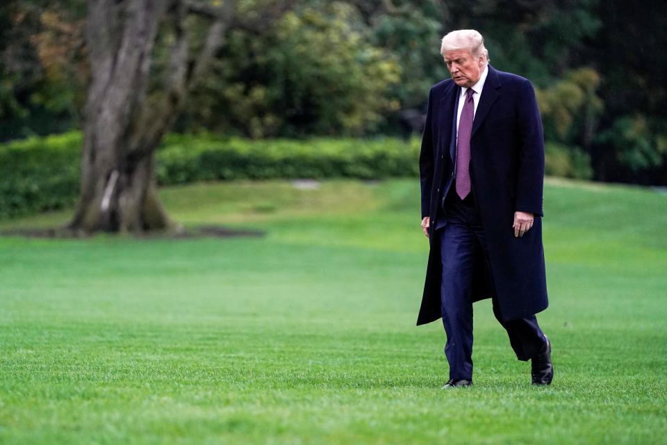 Donald Trump walks from Marine One as he returns from Bedminster, New Jersey on the South Lawn of the White House in Washington, 1 October, hours before he announced he had tested positive for coronavirusREUTERS