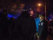 Minneapolis Deputy Chief of Police Medaria Arradondo (R) speaks with people outside of the 4th Precinct Police Station after five people were shot at a Black Lives Matters protest on November 24, 2015 in Minneapolis, Minnesota