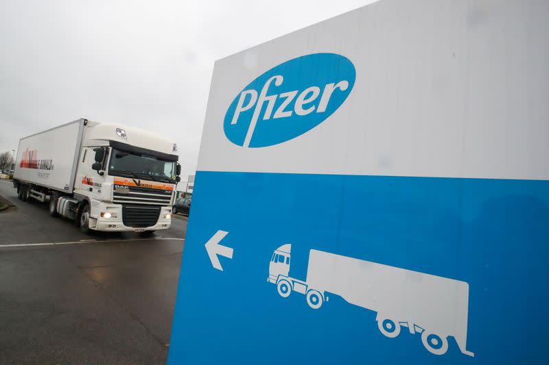 A refrigerated truck leaves the Pfizer plant in Puurs