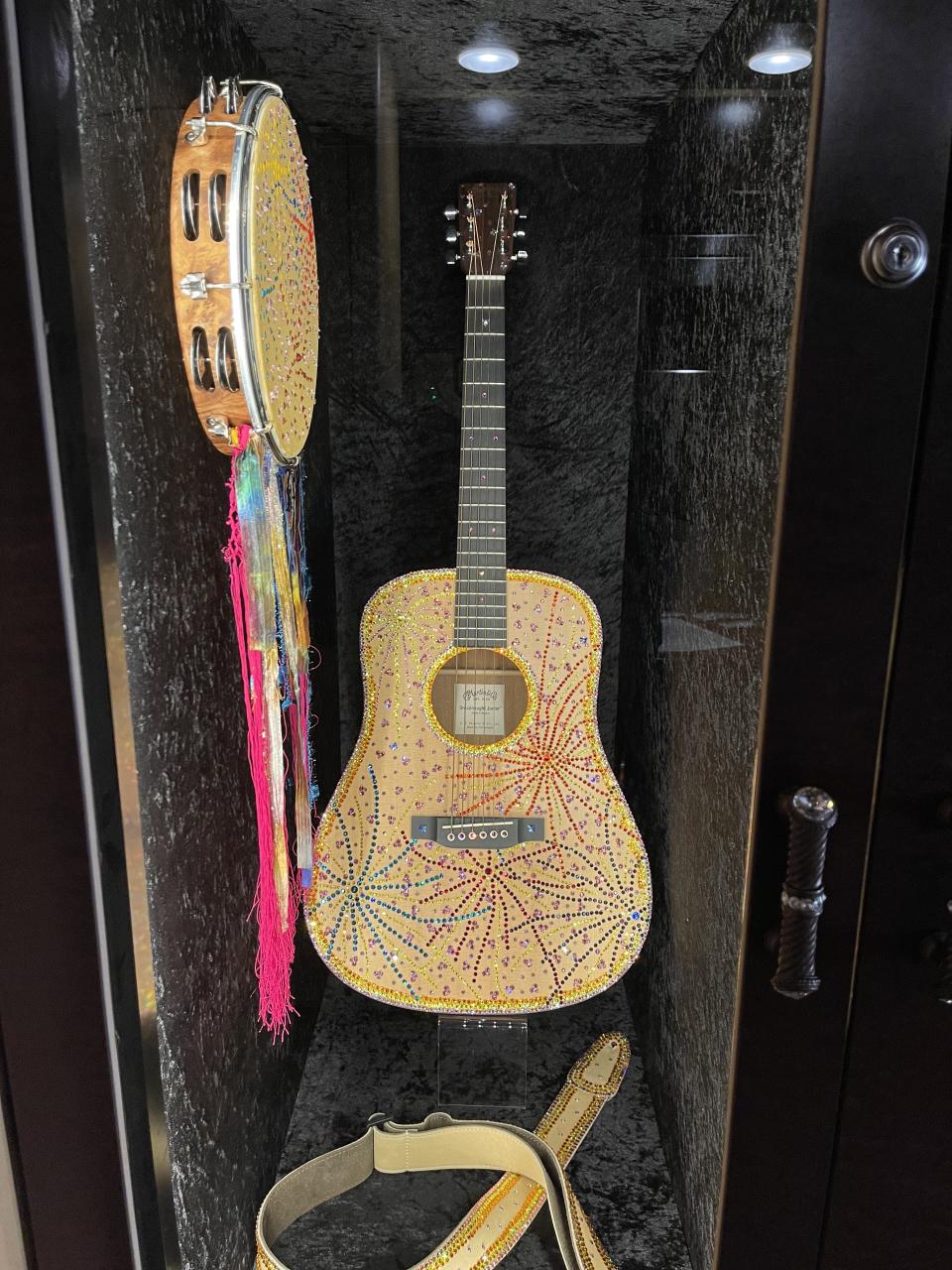 Parton played this sparkly guitar on Netflix's Dolly Parton's Heartstrings.
