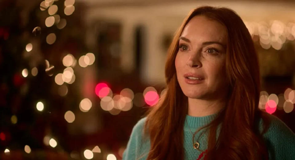 Lindsay Lohan retomou sua carreira muito tempo depois e em 2022 protagonizou o filme Uma Quedinha de Natal. (Imagem:Reprodução/Netflix).