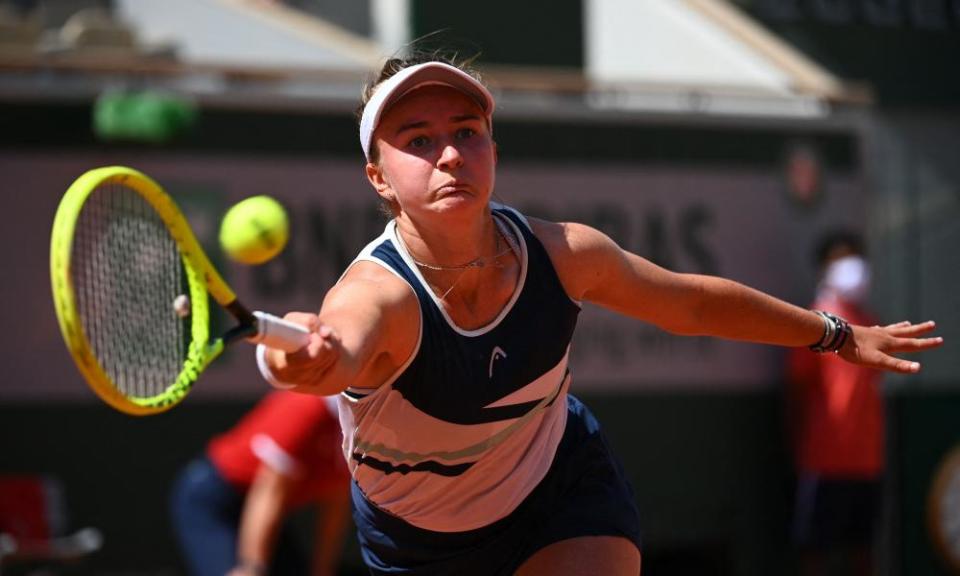 Barbora Krejcikova returns the ball to Coco Gauff during their quarter-final at Roland Garros