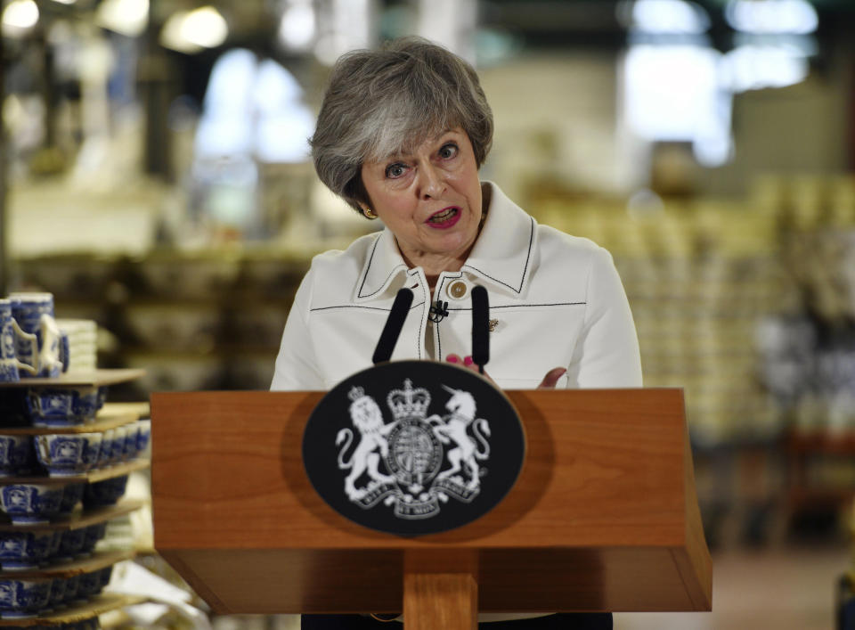 Britain's Prime Minister Theresa May delivers a speech during a visit to the Portmeirion pottery factory in Stoke-on-Trent, England, Monday, Jan. 14, 2019. May is due to make a statement in the House of Commons on Monday afternoon, a day before lawmakers are due to vote on her EU divorce deal. May argues that defeating the deal could open the way for EU-backing legislators to block Brexit. (Ben Birchall/PA via AP)