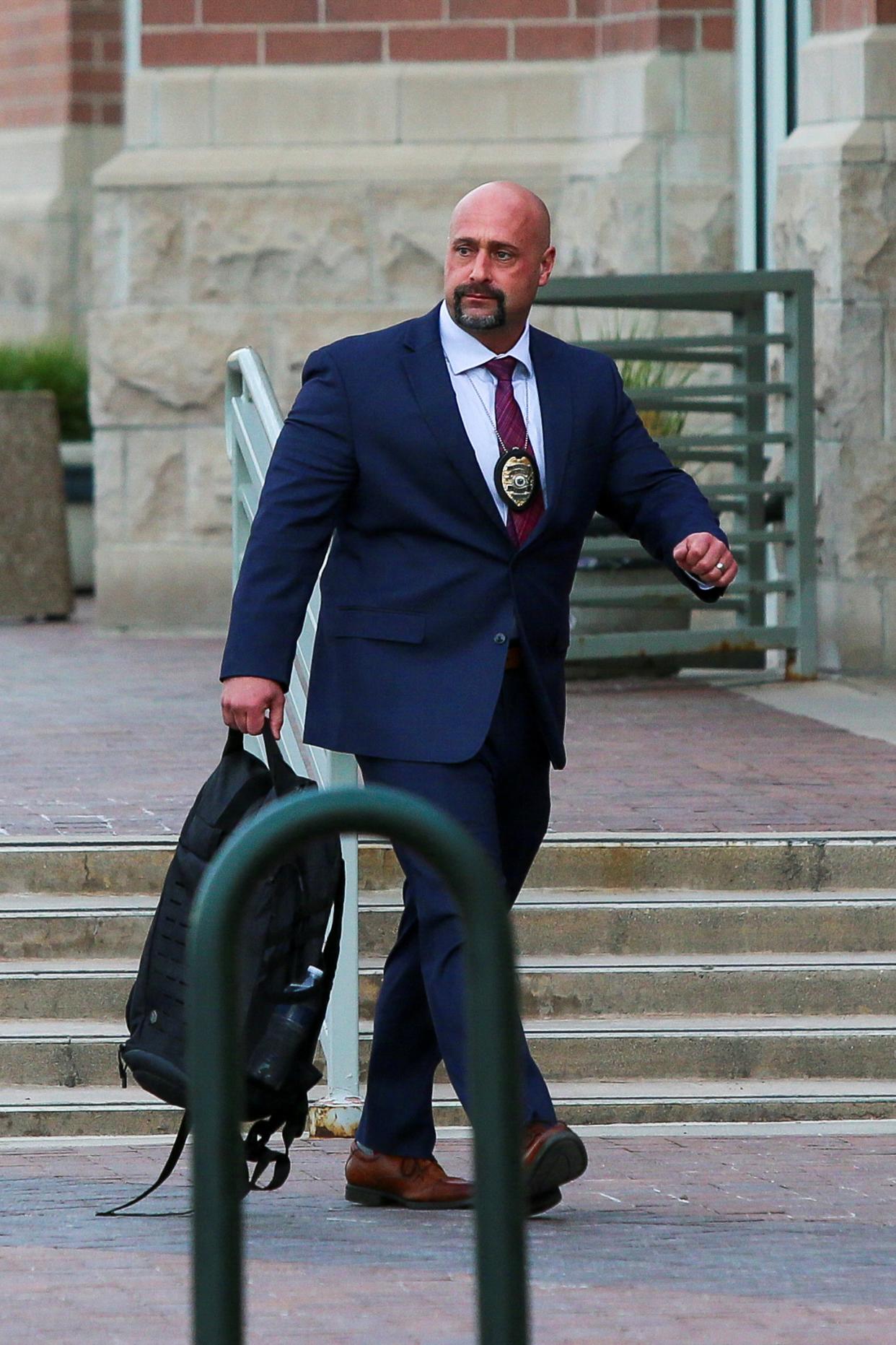 Rexburg Police Detective Ray Hermosillo arrives at the courthouse on the first day of Lori Vallow Daybell's murder trial (REUTERS)