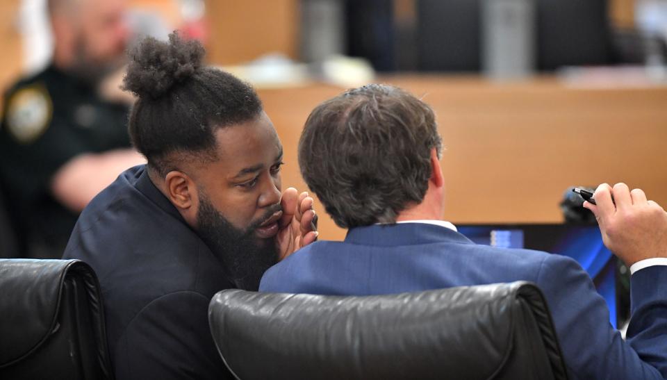 Ralph Williams, left, speaks to his attorney Jervis Wise during testimony Wednesday, Sept. 13, 2023 at the Manatee County Courthouse in Bradenton. Williams is on trail for first degree murder in the 2006 death of his girlfriend, Amber Woods.