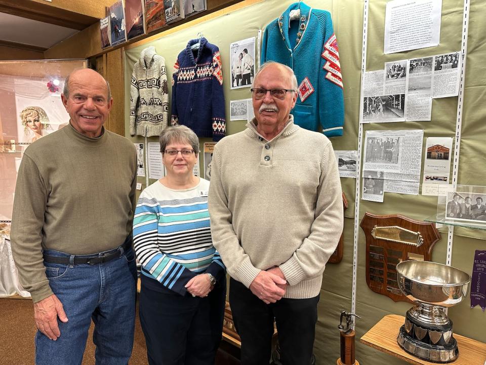 Sam Calles, Marie Stang of the Kimberley Heritage Museum, and Kimberley Curling Club past president John McGillivray are pictured at a the Kimberley Heritage Museum, which is hosting an exhibit on the Kimberley Curling Club until April 30.