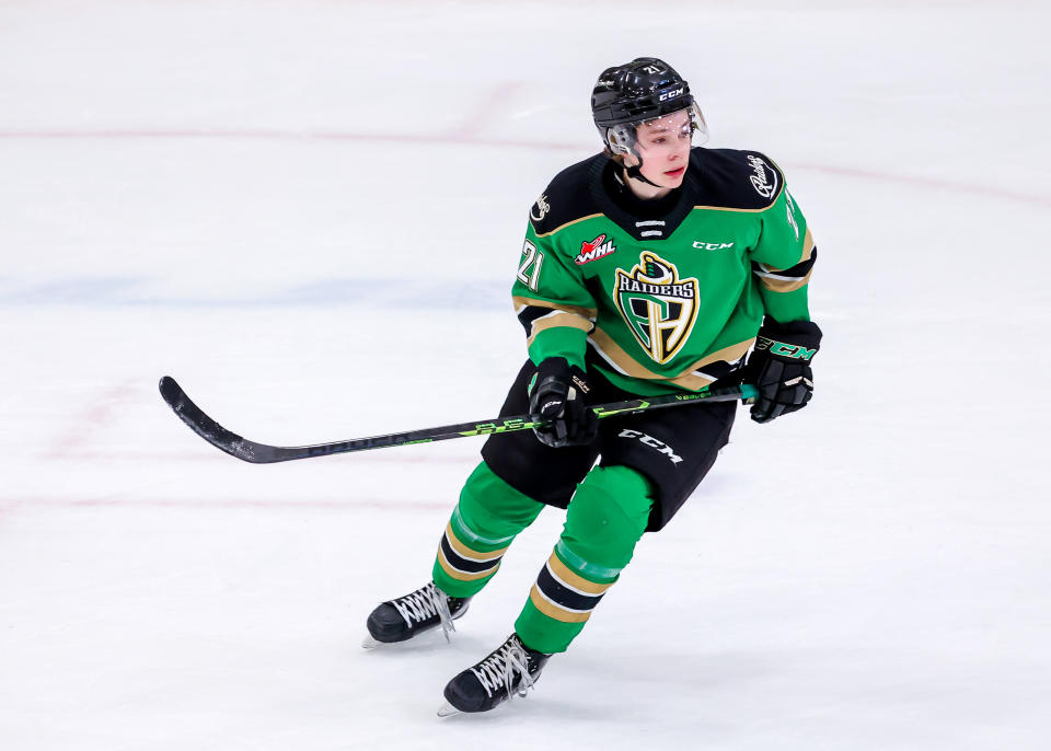 WINNIPEG, CANADA - MARCH 18: Ryder Ritchie #21 of the Prince Albert Raiders skates during second period action against the Winnipeg ICE at Wayne Fleming Arena on March 18, 2023 in Winnipeg, Manitoba, Canada. (Photo by Jonathan Kozub/Getty Images)