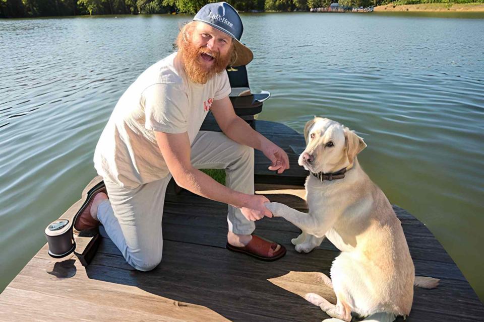 <p>Courtesy of Lake Hour</p> Wyatt Russell with Roy Hawn Russell, the Labrador retriever of Wyatt