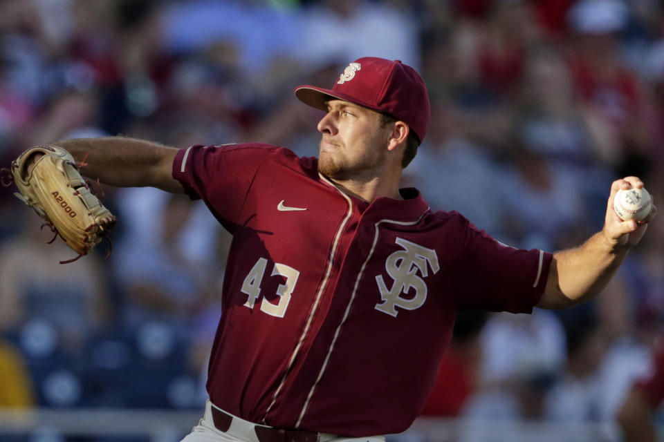 Florida State starting pitcher Drew Parrish (43) works against Arkansas in the fourth inning of an NCAA College World Series baseball game in Omaha, Neb., Saturday, June 15, 2019. (AP Photo/Nati Harnik)