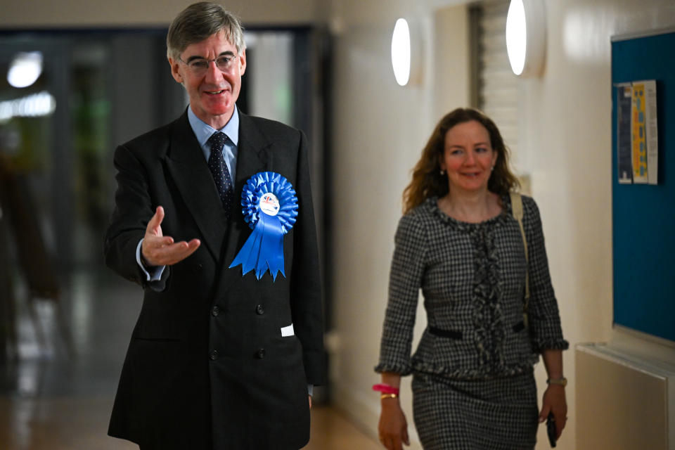 BATH, ENGLAND - JULY 05: Jacob Rees-Mogg, UK member of parliament, arrives with his wife Helena de Chair for the count for the North East Somerset Constituency at the University of Bath campus on July 05, 2024 in Bath, England. The incumbent MP for North East Somerset is the Conservative Jacob Rees-Mogg. In Boris Johnson's government, he held the position of Secretary of State for Business, Energy and Industrial Strategy. (Photo by Finnbarr Webster/Getty Images)