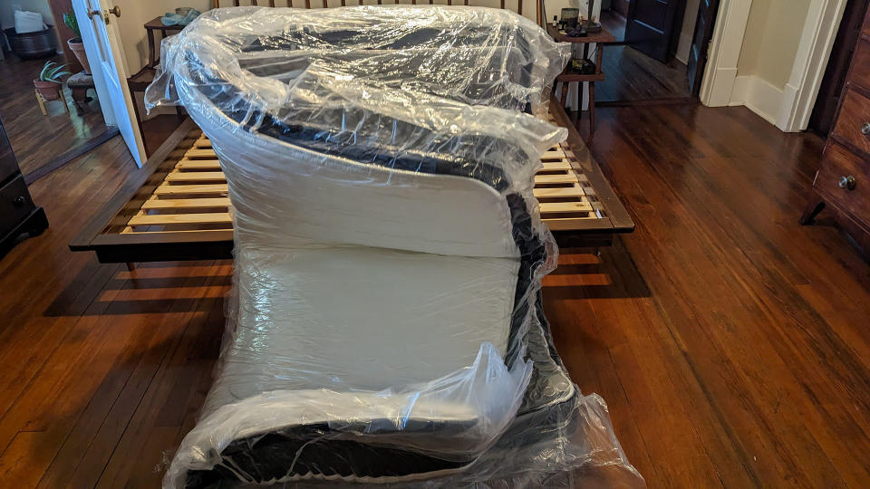 Brooklyn Bedding Signature Hybrid mattress rolled and vacuum packed but starting to unfurl