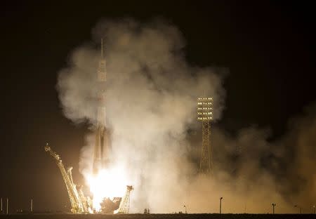 The Soyuz TMA-17M spacecraft carrying the International Space Station (ISS) crew of Kjell Lindgren of the U.S., Oleg Kononenko of Russia and Kimiya Yui of Japan blasts off from the launch pad at the Baikonur cosmodrome, Kazakhstan, July 23, 2015. REUTERS/Shamil Zhumatov