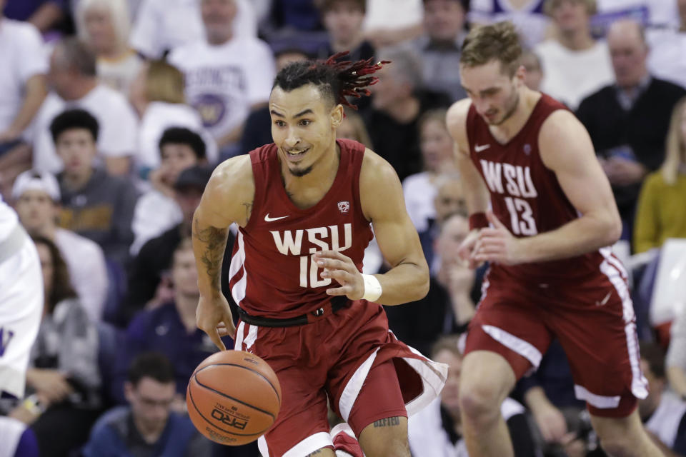 Washington State's Isaac Bonton drives upcourt during the first half of the team's NCAA college basketball game against Washington on Friday, Feb. 28, 2020, in Seattle. (AP Photo/Elaine Thompson)