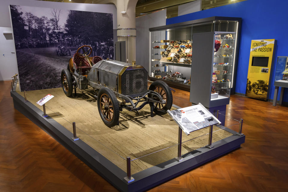 This image provided by the The Henry Ford, shows a display with the “Old 16” car from the 1908 Vanderbilt Cup race, part of the Driven To Win exhibit at the The Henry Ford Museum in Dearborn, Mich. (Wes Duenkel/The Henry Ford via AP)