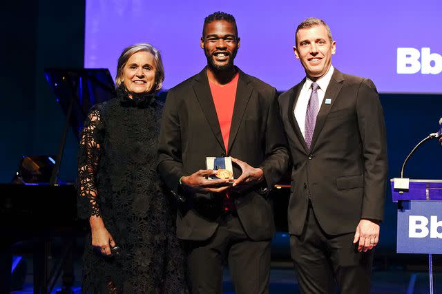 <p>Tony Powell</p> Oliver James accepts the Barbara Bush National Literacy Honor Award from Barbara Bush Foundation Honorary Chair Doro Bush Koch and Interim President & CEO Andrew Roberts