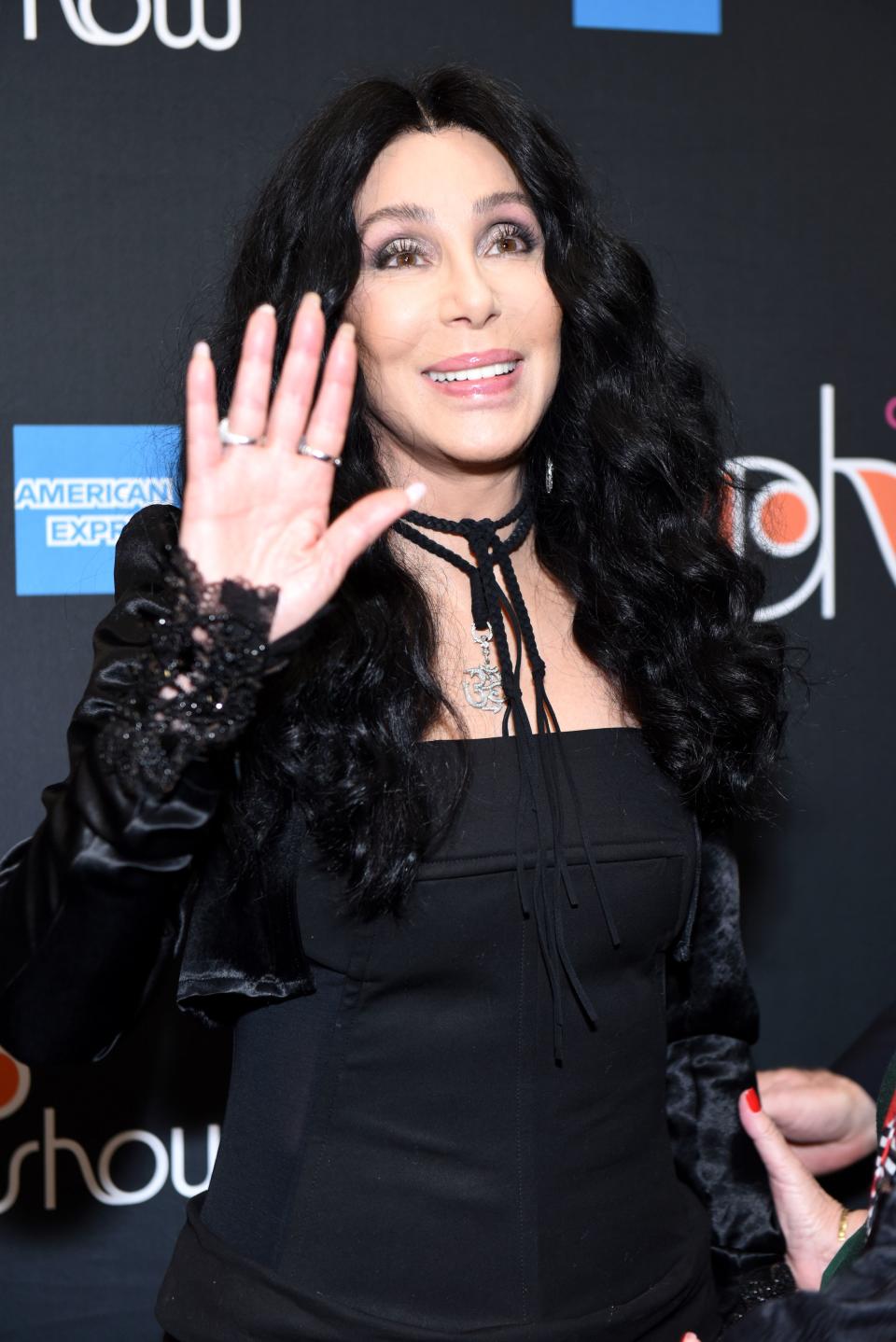 Cher gives a wave upon arrival at "The Cher Show" Broadway