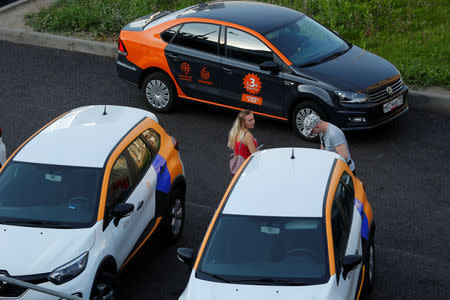 Delimobil and Yandex.Drive carsharing cars are seen in Moscow, Russia September 5, 2018. REUTERS/Sergei Karpukhin