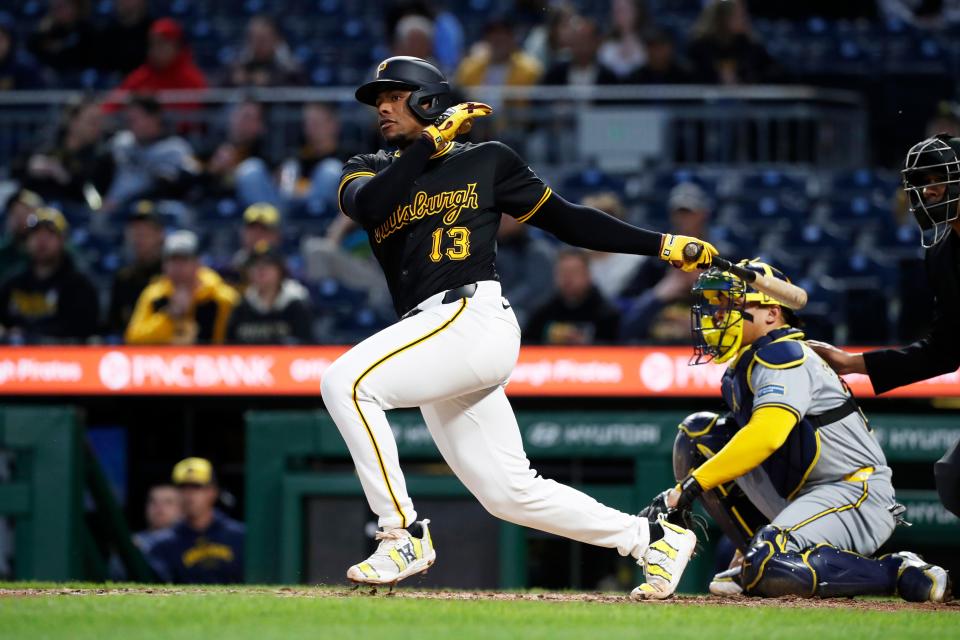 Pirates third baseman Ke'Bryan Hayes hits a single off Brewers starter Joe Ross to start the Pittsburgh rally Monday night.