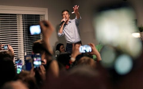 The 2020 presidential candidate gesticulates enthusiastically as he speaks to a crowd in Iowa - Credit: Reuters