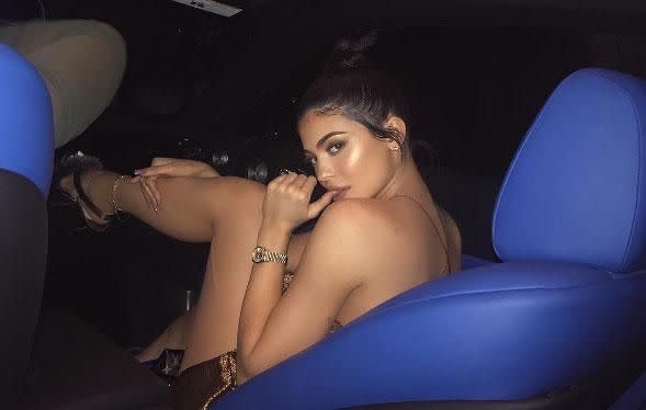 Taking to Instagram, the 19-year-old reality star let the scar on her left thigh be visible, as she posed in a slinky gold dress. Source: Instagram
