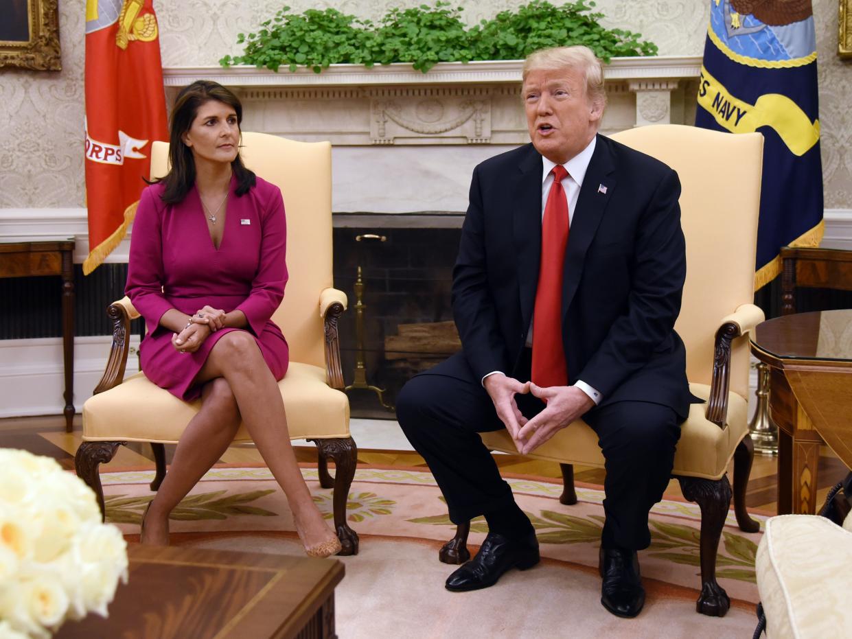 Nikki Haley and Donald Trump in the Oval Office in the White House on October 9, 2018. (AFP via Getty Images)