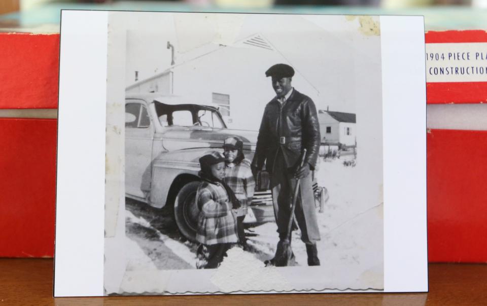 This photo shows a family who lived in the first home for Black defense workers in South Bend, near the Studebaker plant, in the 1950s African American Worker’s Home at The History Museum in South Bend.