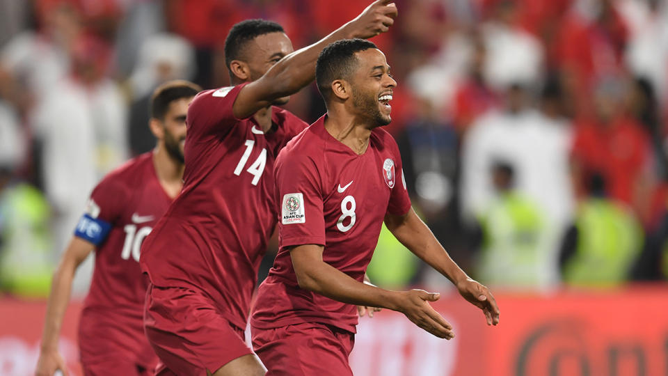 Hamid Ismaeil Khaleeefa of Qatar celebrates their fourth goal. (Photo by Masashi Hara/Getty Images)