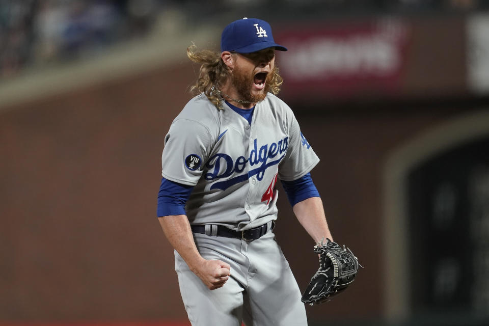 Los Angeles Dodgers pitcher Craig Kimbrel reacts after striking out San Francisco Giants' Austin Slater to end the baseball game in San Francisco, Wednesday, Aug. 3, 2022. (AP Photo/Jeff Chiu)