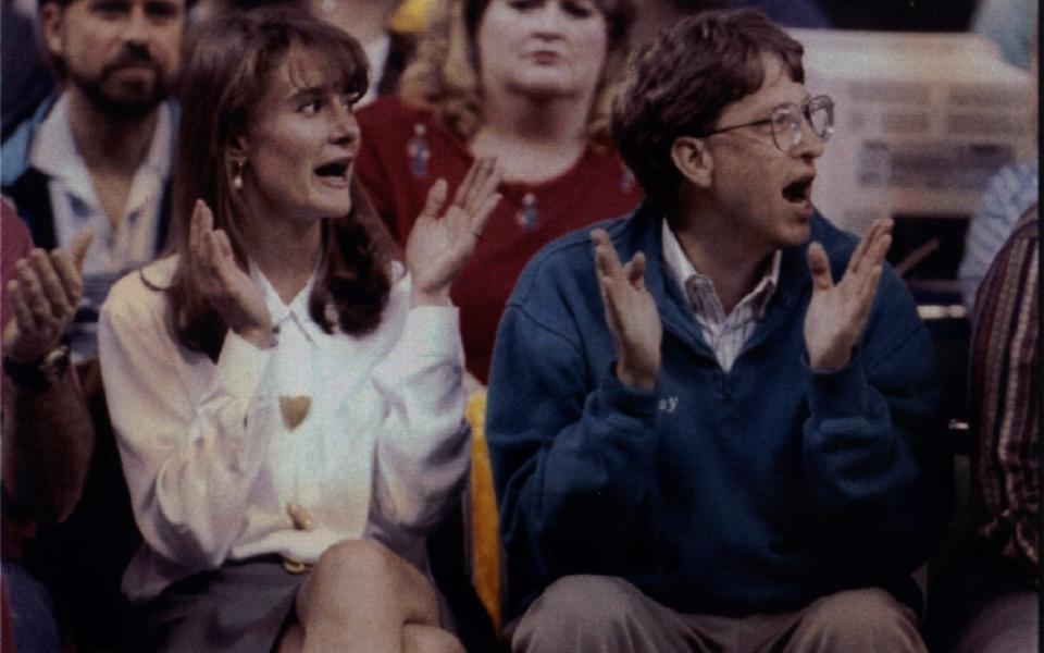 Bill and Melinda courtside - AP