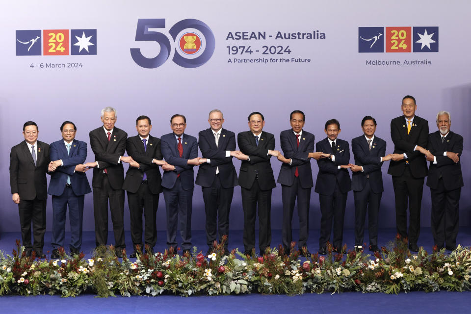 Members of ASEAN pose for a family photo during the Association of Southeast Asian Nations, ASEAN-Australia Special Summit in Melbourne, Australia, Tuesday, March 5, 2024. From left, Secretary General of ASEAN Dr Kao Kim Hourn, the Prime Minister of Vietnam, Pham Minh Chinh, the Prime Minister of Singapore, Lee Hsien Loong, the Prime Minister of Cambodia, Samdech Hun Manet, the Prime Minister of Malaysia, Anwar Ibrahim, the Prime Minister of Australia Anthony Albanese, the Prime Minister of Lao, Sonexay Siphandone, the Indonesian President Joko Widodo, the Sultan of Brunei, Haji Hassanal Bolkiah, the President of the Philippines, Ferdinand Marcos Jr., the Prime Minister of Thailand, Srettha Thavisin, and the Prime Minister of Timor-Leste, Xanana Gusmao. (AP Photo/Hamish Blair)