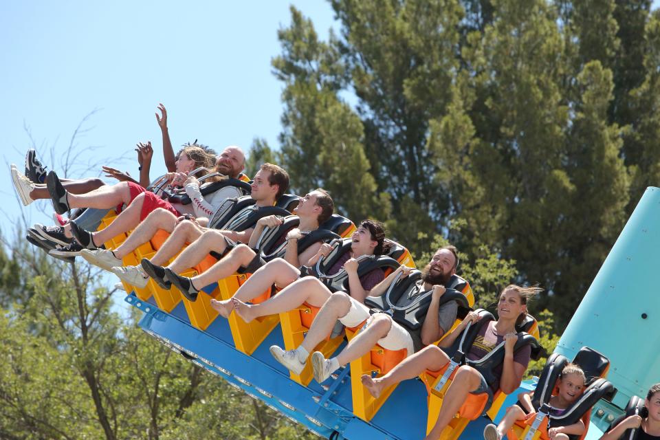 Pandemonium, a pendulum ride at Six Flags Over Georgia climbs 15 stories high.