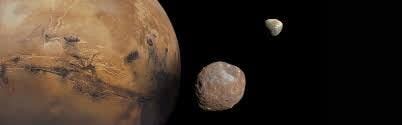 Mars und seine Monde, Deimos und Phobos. - Copyright: NASA