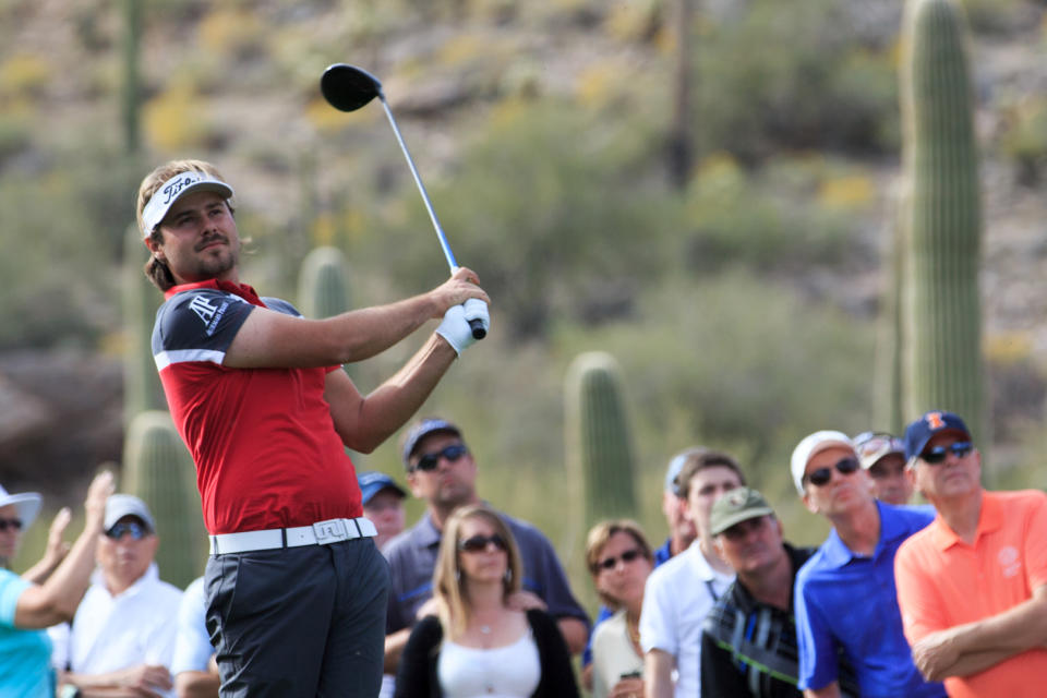 Victor Dubuisson swings on the 15th hole during the WGC-Accenture Match Play Championship at The Golf Club at Dove Mountain. (Allan Henry-USA TODAY Sports)