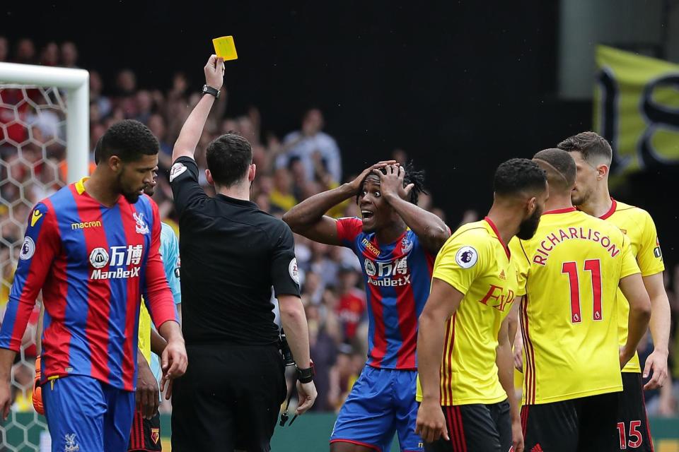 Simulation: Zaha reacts after receiving a yellow card: Getty Images