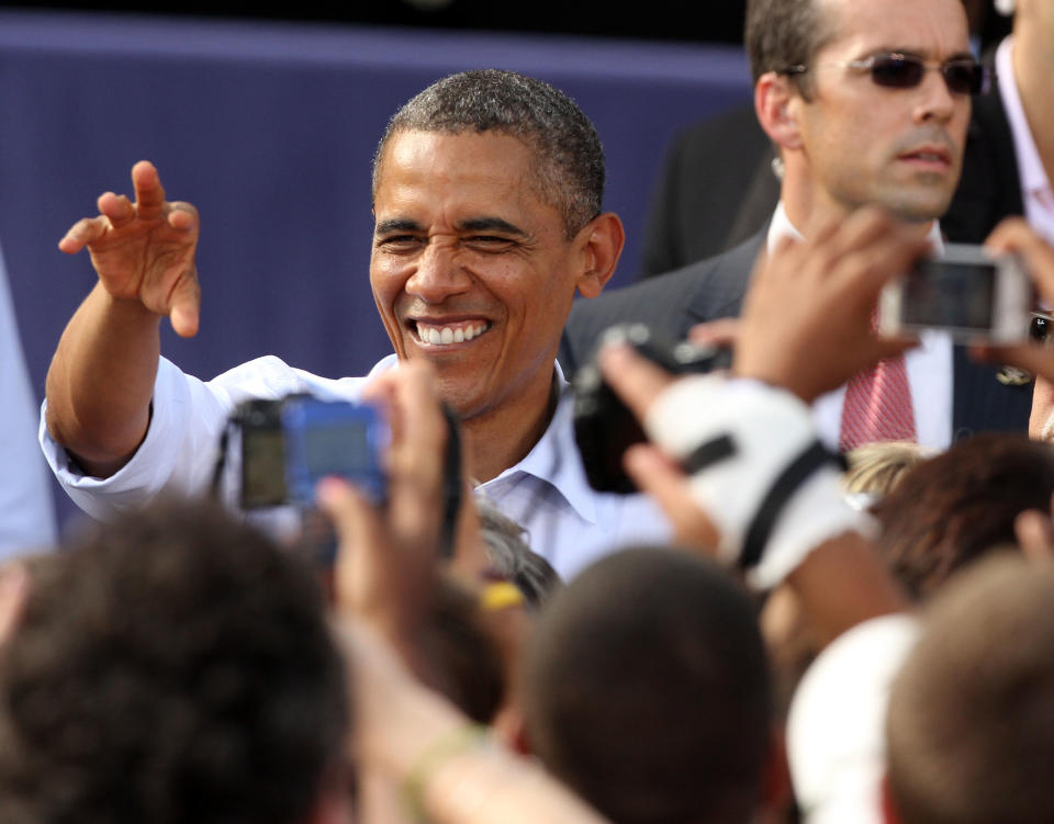 President Barack Obama greets supporters during a campaign stop Saturday, Aug. 18, 2012 in Rochester, N.H. (AP Photo/Jim Cole)