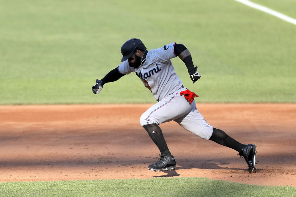 Miami Marlins' Jonathan Villar runs to second base on a ground out by Jon Berti during the third inning in game one of a baseball double-header against the Baltimore Orioles, Wednesday, Aug. 5, 2020, in Baltimore. (AP Photo/Julio Cortez)