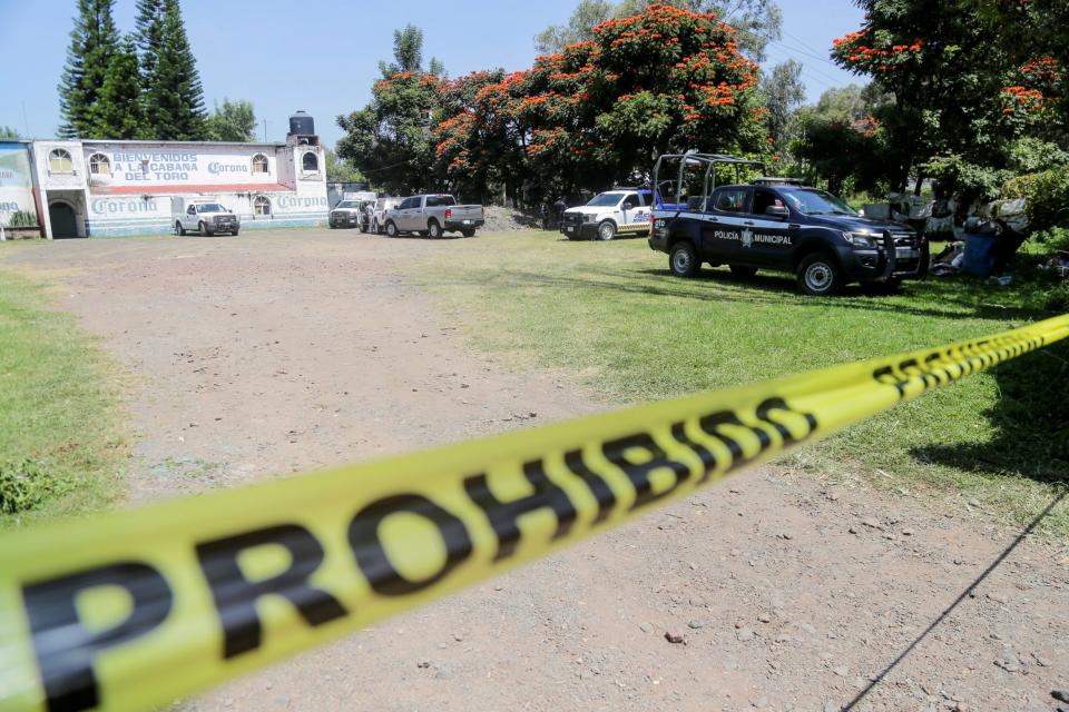 A police tape is seen outside a bar after a massacre in a bar left eleven people dead in Jaral del Progreso (REUTERS)